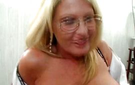 Pungent blond milf Angie got down on her knees to suck her pal's strong meat member